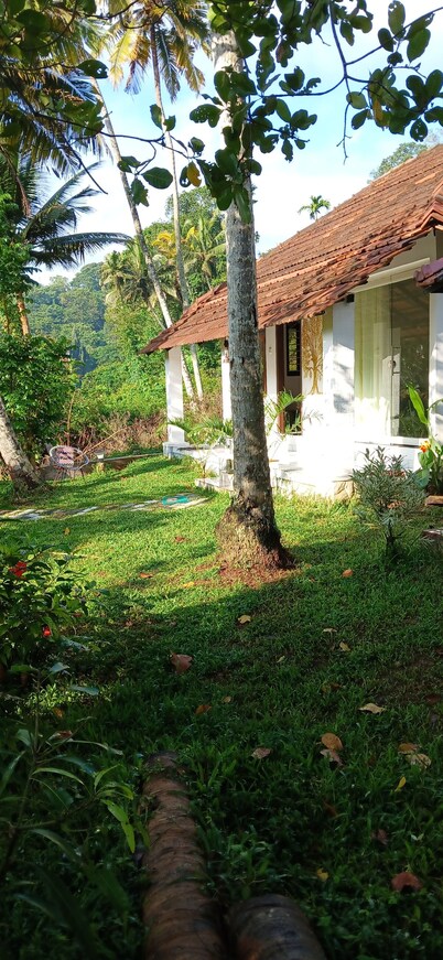 Canan Lake Home – A Serene Riverside Escape in God’s Own Country