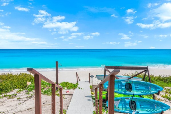 On the beach, sun-loungers, beach towels