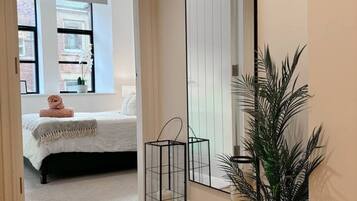 2 bedrooms, desk, iron/ironing board, travel crib