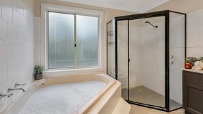 Shower, hair dryer, towels, shampoo