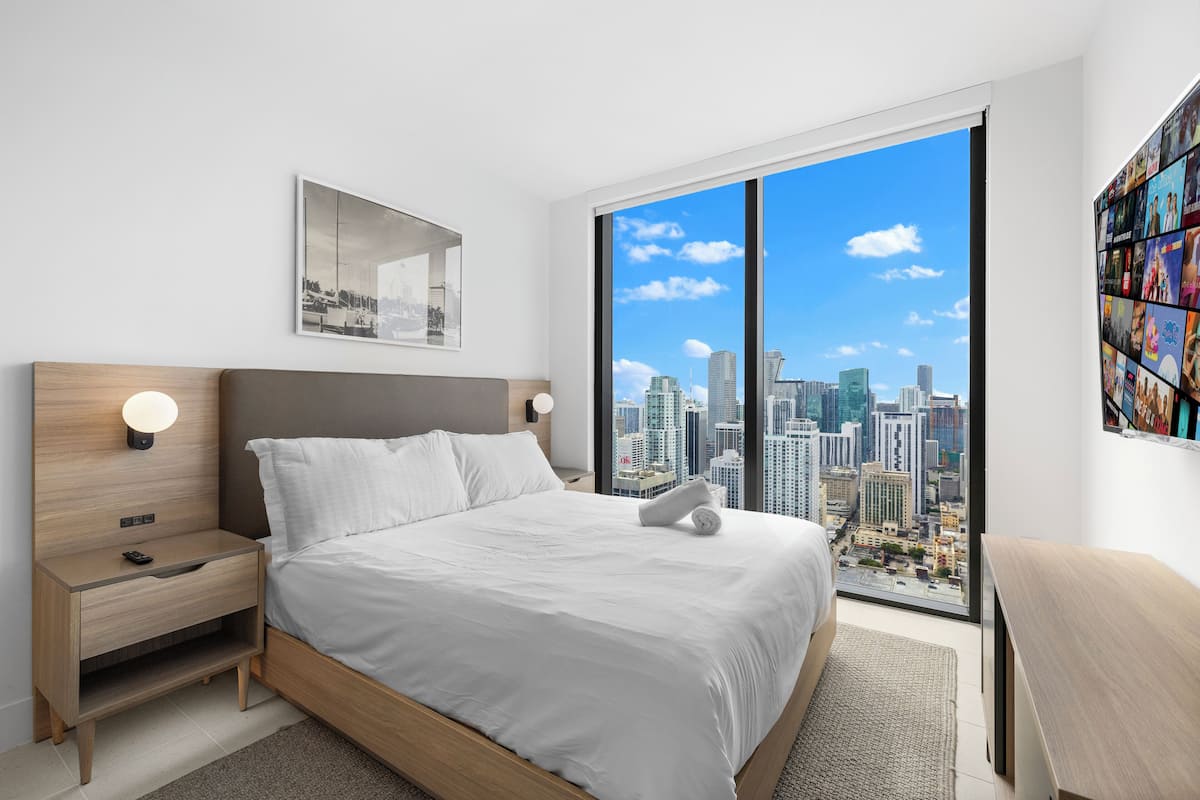 2 bedrooms, premium bedding, laptop workspace, blackout curtains