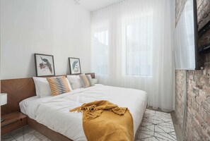 2 bedrooms, desk, iron/ironing board, travel crib