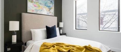 1 bedroom, desk, iron/ironing board, travel crib