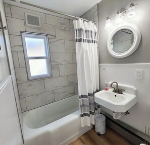 Hair dryer, towels, soap, shampoo