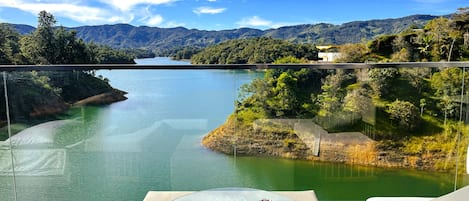 Superior Room with Balcony, Lake View | Pillowtop beds, individually decorated, individually furnished