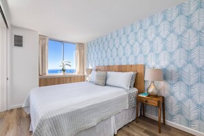 1 bedroom, desk, iron/ironing board, travel crib