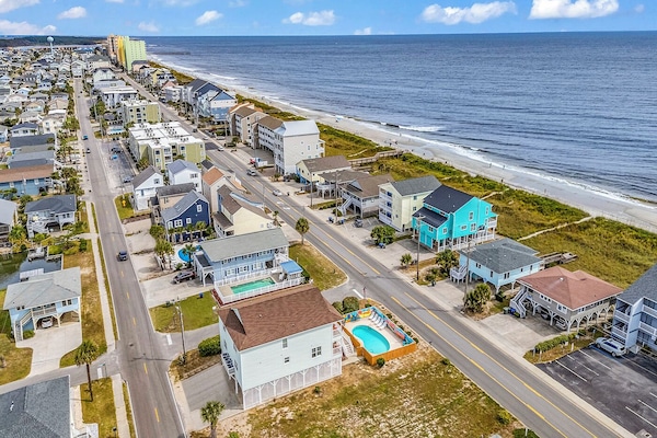 An aerial view of our home, showing we are just steps to the beautiful beach
