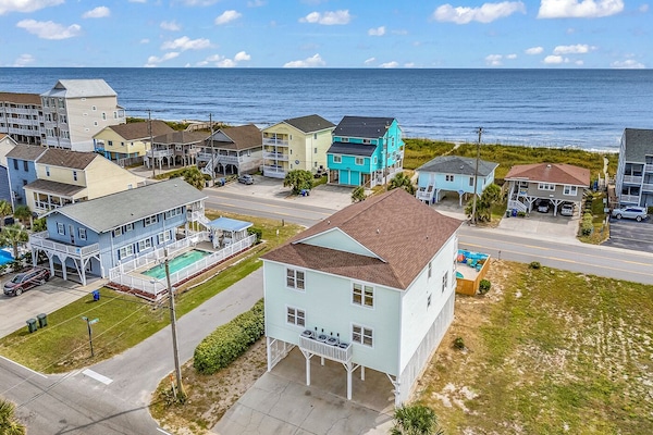 An aerial view of our home, showing we are just steps to the beautiful beach