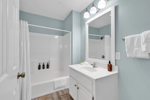 Hair dryer, towels, soap, shampoo