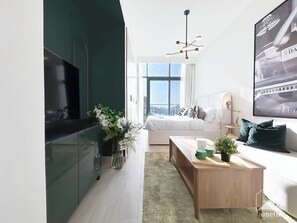 Iron/ironing board, Internet, bed sheets - Bright Studio in Azizi Riviera Perfect City Escape (Dubai)