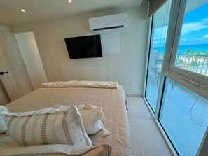 1 bedroom, desk, iron/ironing board, travel crib