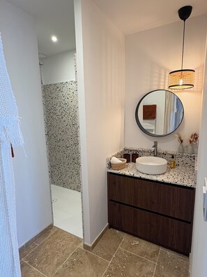 Shower, hair dryer, towels, soap