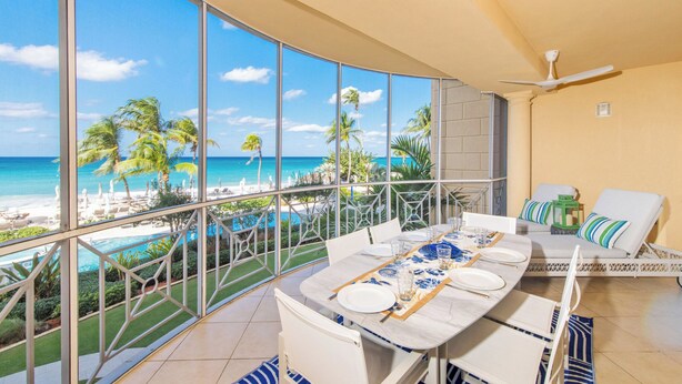 Outdoor dining - The Meridian, Villa 9, Second floor 3BR/3B, Oceanfront, fully equipped. (Seven Mile Beach)