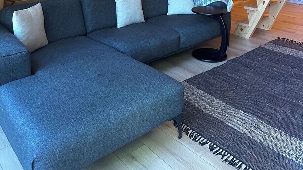 A wooden interior with a sectional sofa, a small table, and a staircase. - Chalet Sapanca (Sapanca)