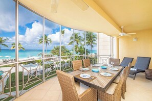 Outdoor dining - The Meridian, Villa 11, Second floor, 3Bed 3Bath, Oceanfront, fully equipped. (Seven Mile Beach)
