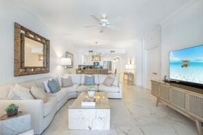 TV, DVD player - Villa 23, Forth floor 3 bedroom, 3 bathroom, oceanfront, fully equipped. (Seven Mile Beach)