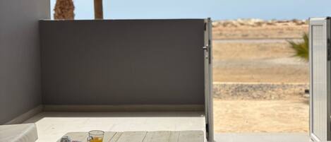 Departamento Confort, vista al océano | Terraza o patio