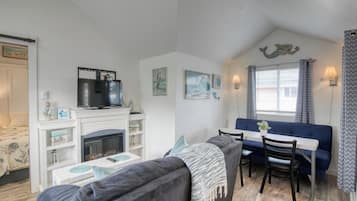 Cottage 2 | Living area | 55-inch flat-screen TV with digital channels