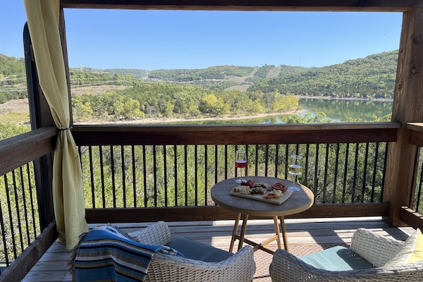 Enjoy morning coffee or evening beverages on the private primary suite balcony