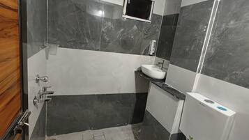 Luxury Double or Twin Room, City View | Bathroom | Shower, slippers, towels, soap
