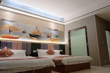Room. Q+ Nanxiong Xinhewan Business Hotel
