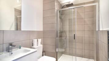 Standard Apartment, City View | Bathroom | Shower, free toiletries, hair dryer, towels