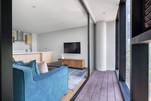 Comfort appartement | Woonruimte | Flatscreentelevisie