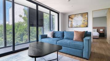 Comfort Apartment | Living area | Flat-screen TV