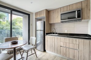 Departamento Deluxe | Área de sala de estar