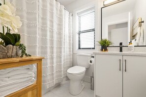 Hair dryer, towels, soap, shampoo