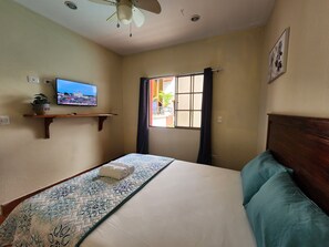 Comfort Room, Air conditioning, Pool View | Down duvets, blackout curtains, free WiFi, bed sheets
