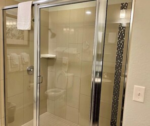 Hair dryer, towels, soap, shampoo