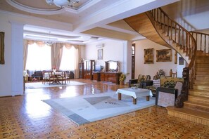 Junior Villa, Balcony, Garden View | Living area | 20-inch Smart TV with cable channels, DVD player, books - Premier Villas (Baku)