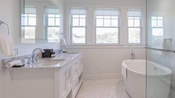 Separate tub and shower, slippers, towels