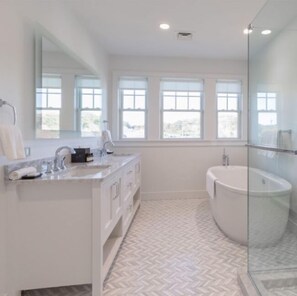 Separate tub and shower, slippers, towels