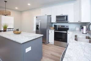 Fridge, microwave, dishwasher, coffee/tea maker