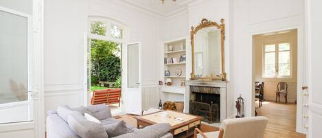 TV, fireplace, books
