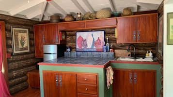 Microwave, coffee/tea maker, toaster, cookware/dishes/utensils