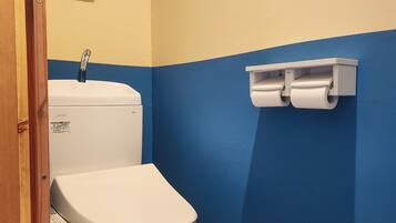 Separate bathtub and shower, hair dryer, towels, soap