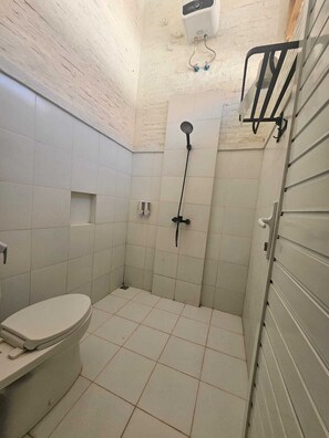 Romantic Room, 1 Bedroom, Pool Access, Beach View | Bathroom | Separate tub and shower, slippers, towels, soap
