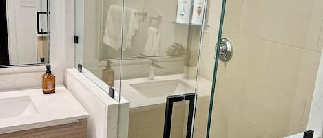 Shower, hair dryer, towels, soap