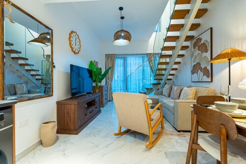 Oasis Bldg 3 G06 · Your Oasis Awaits: New 2BR Duplex with POOL