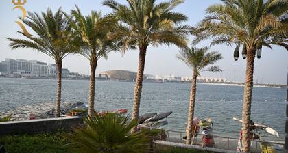 Al Rahbah 1B 207 · Modern 2BR Apartment - Beach Access