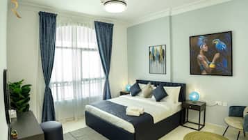 1 chambre, bureau, fer et planche à repasser, lit parapluie