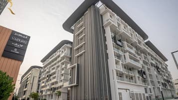 Surround yourself with the elegance of city living, as luxury buildings define the skyline.