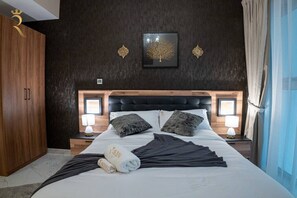 2 habitaciones, tabla de planchar con plancha, cuna de viaje y wifi 