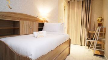 2 slaapkamers, een strijkplank/strijkijzer, reisbedje, gratis wifi