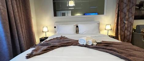 1 غرفة نوم ومكواة/لوح كي وسرير سفر وواي فاي