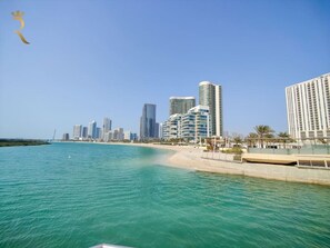 Waves crashing and sun shining—this is what paradise looks like. - Al Reem Mangrove Bliss 1904 - Cozy 2BR Apartment (Abu Dhabi)