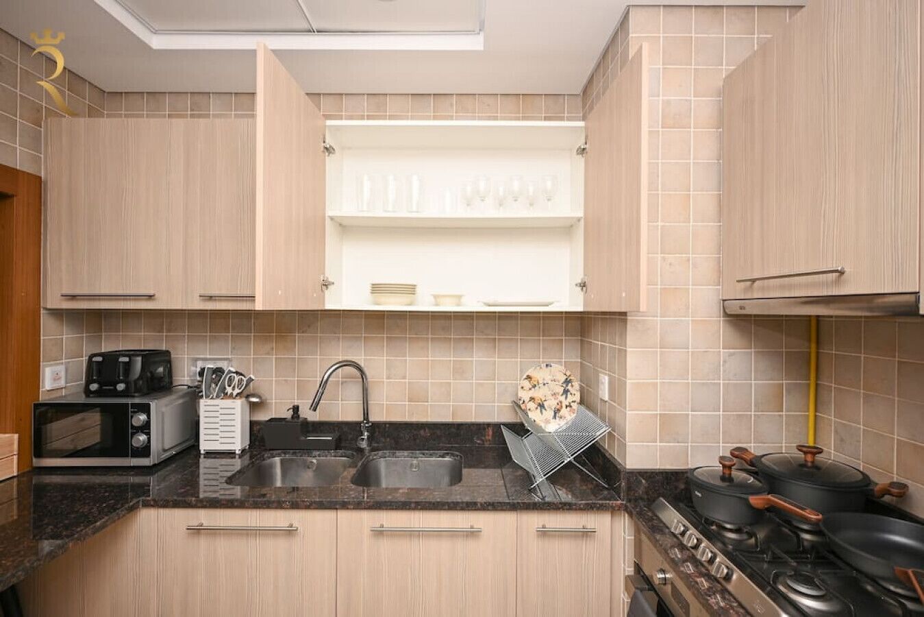 Where cooking becomes an art form – join us in our luxurious and modern kitchen.